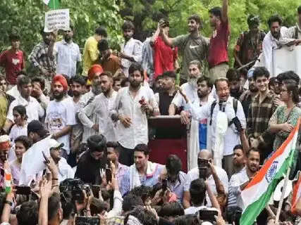 Books, flowers and...Cockroach Janata Party's protest in Jaipur appealing them to bring these